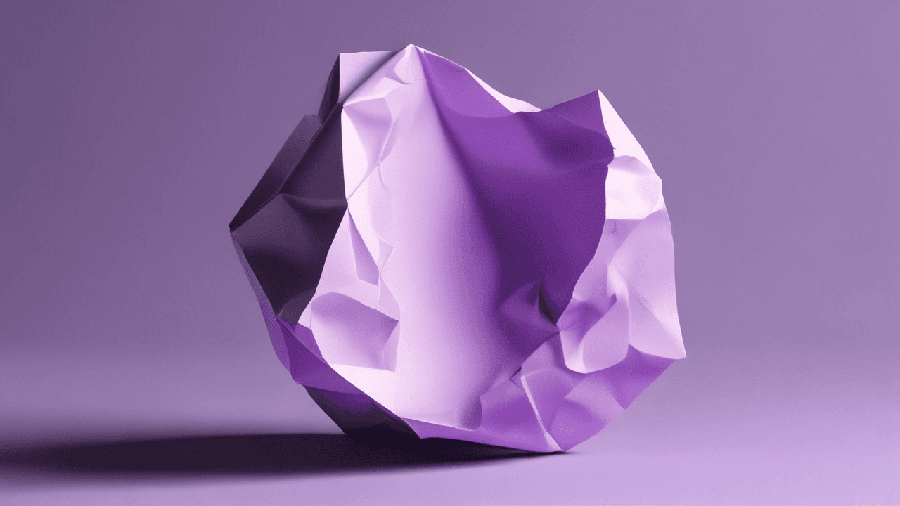 Failure concept: Crumpled paper on purple background, symbolizing setbacks and the need to persevere.